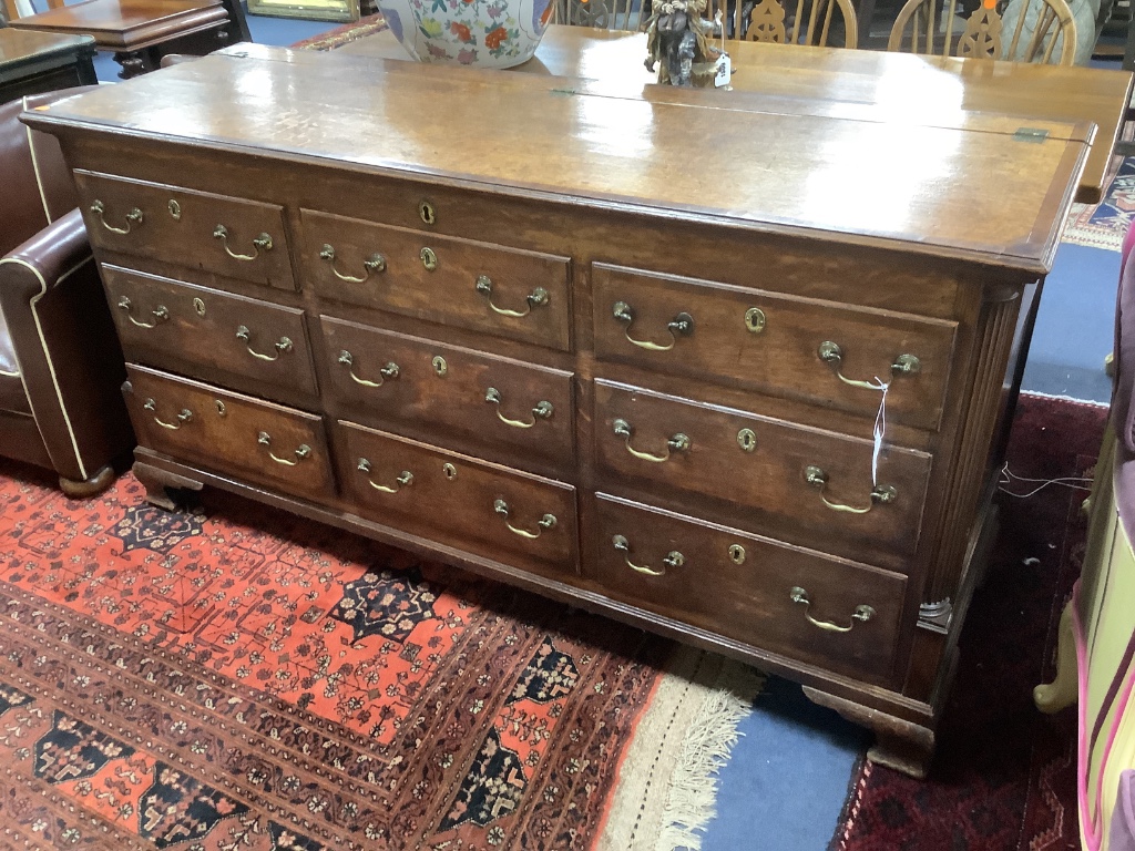 A late 18th century oak and mahogany crossbanded mule chest